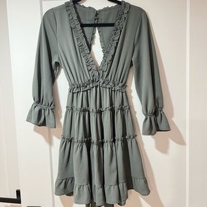 Bought dress for a wedding and only wore it once. Very cute open back.